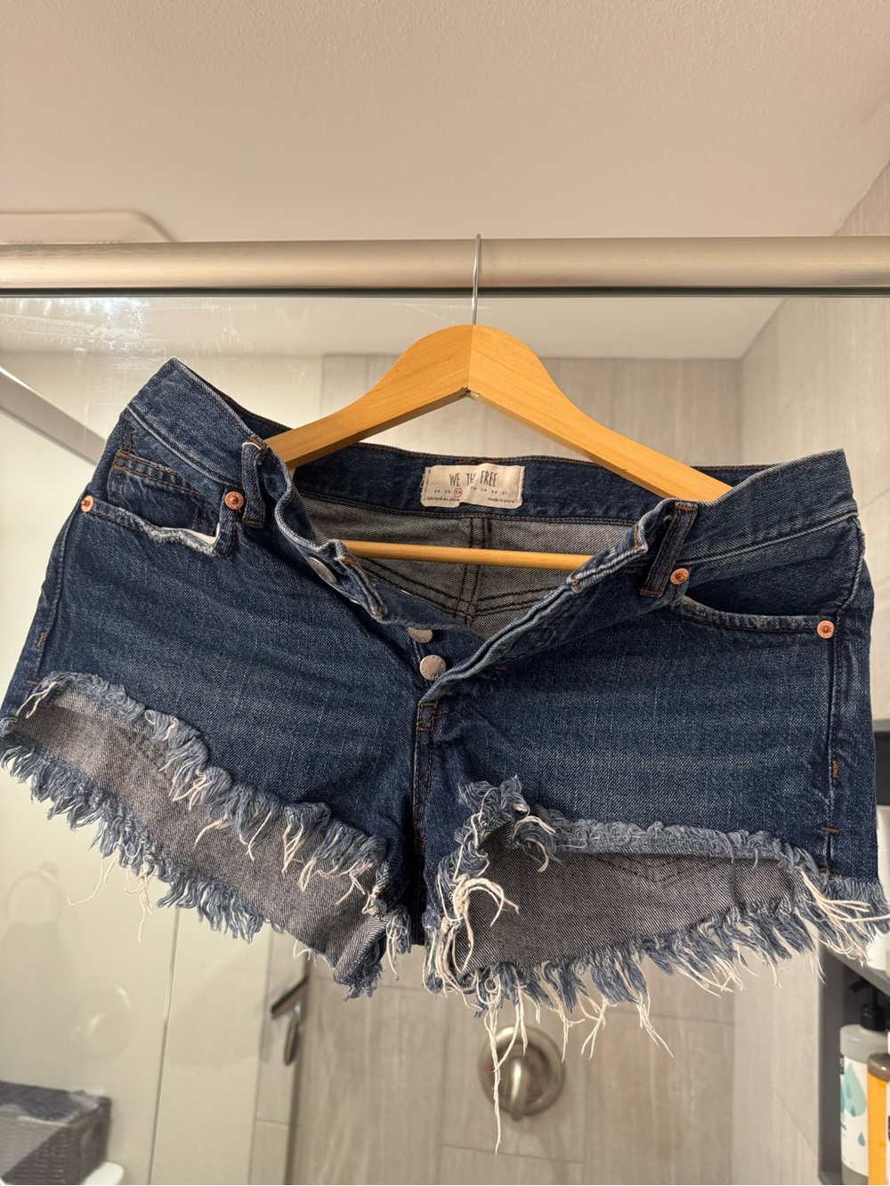 We The Free Dark Blue Distressed Denim Cutoff Shorts